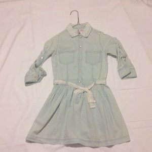 a denim dress with lace details